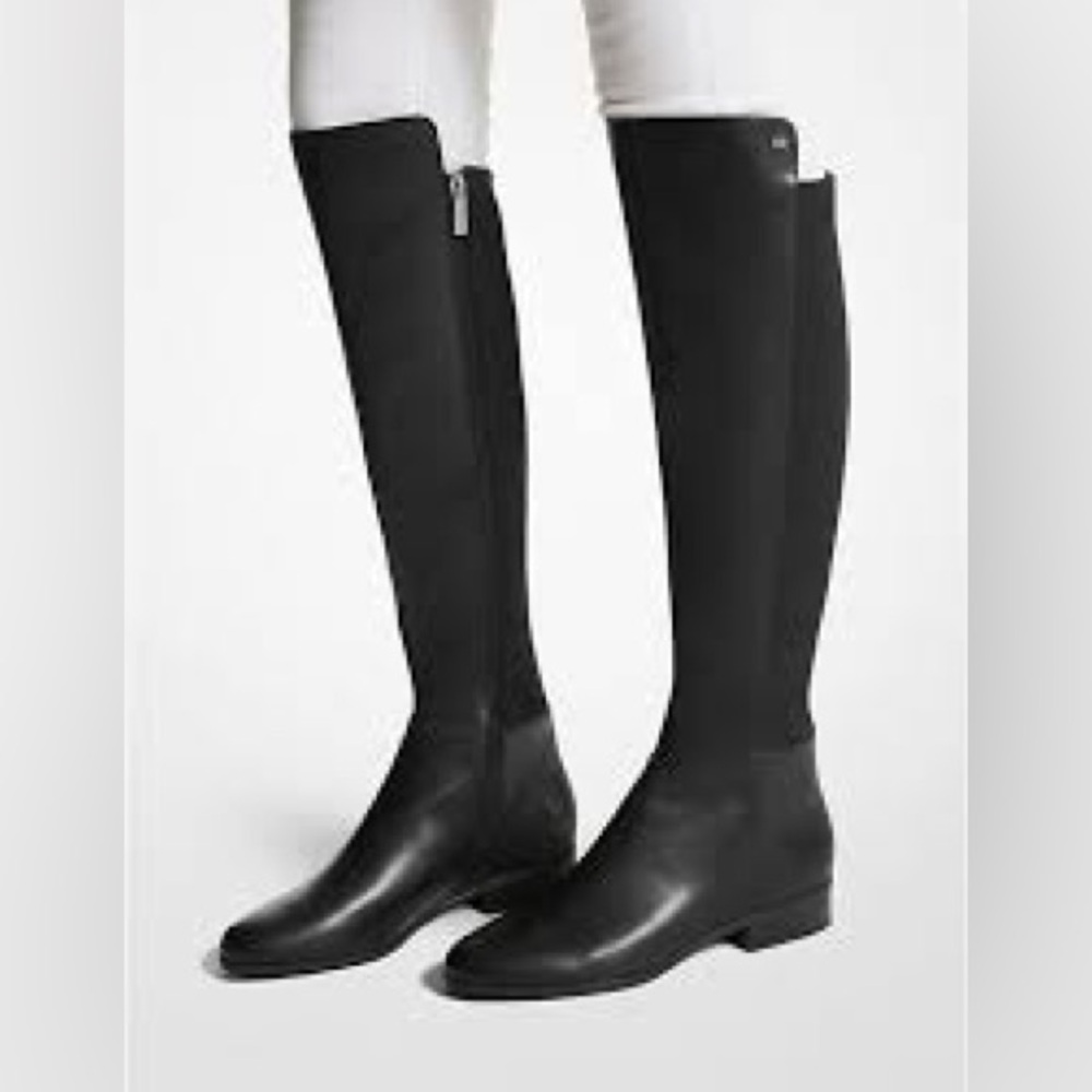 Beautiful and elegant Michael kors flat long boots. Like new . Worn ones.
